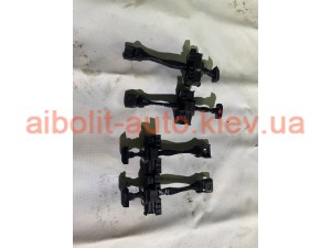 Обмежувач задньої дверки 