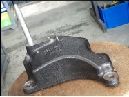 Кронштейн коробки левый Авео